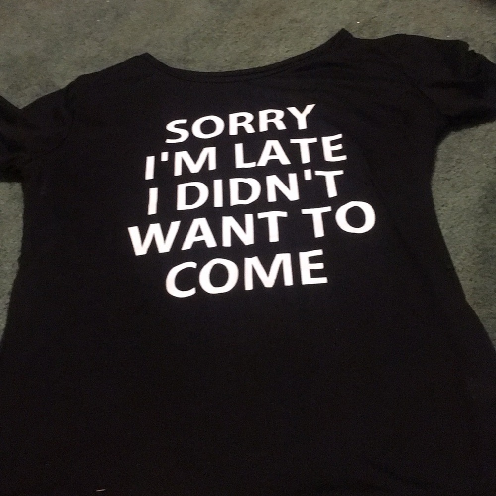 In white short sleeve shirt Never been worn